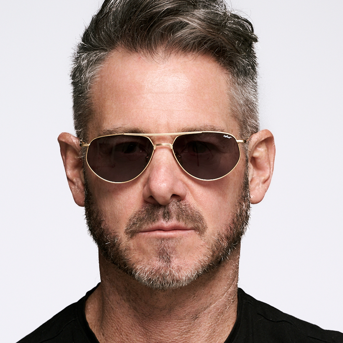 Petra Dorado Lente Gris